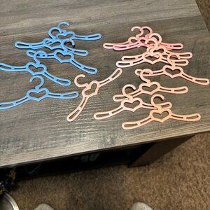 Lot 15 Prog Co doll clothes hangers pink blue